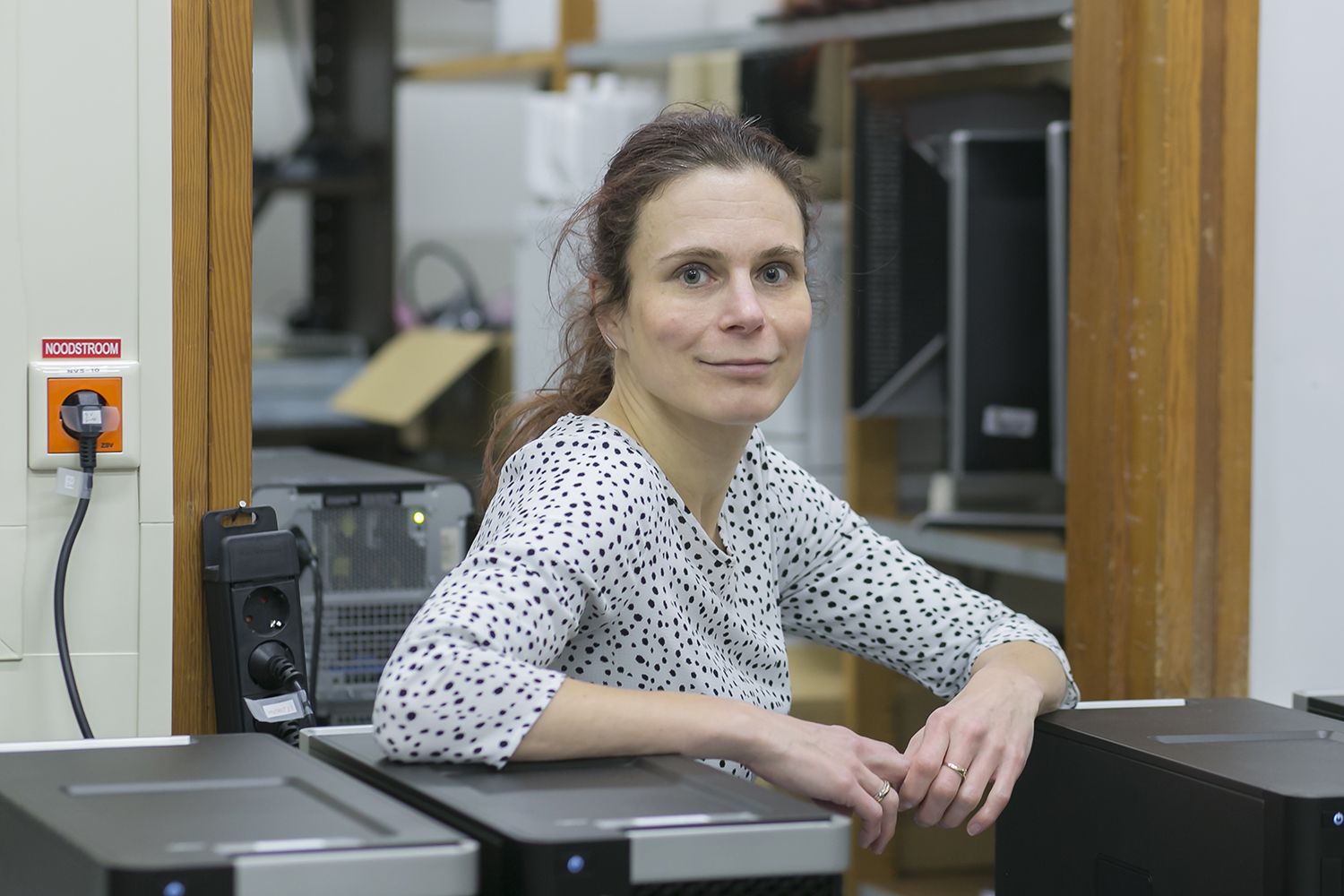 Kirsten in the server room at UU